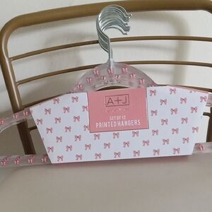 Pink Bow Curved Clothing Hangers Set